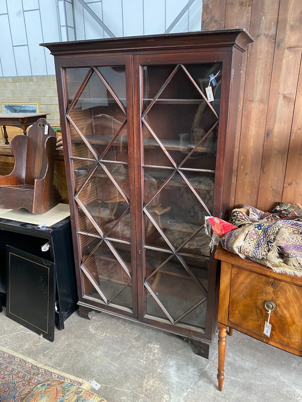 A George III mahogany bookcase, width 116cm, depth 39cm, height 199cm